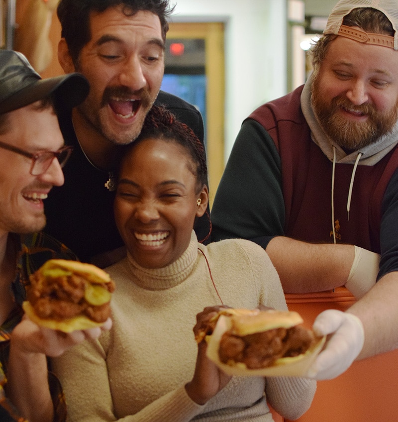 Bonafried customers enjoying sandwiches together
